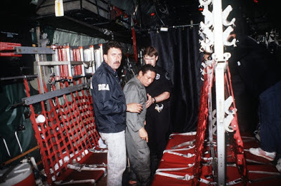 Manuel Noriega with agents from the U.S. DEA
